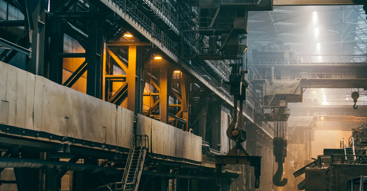 trump-doubling-steel-duties-may-2025 A photo showing the interior of a factory. (Photo: rozetsky / Unsplash)