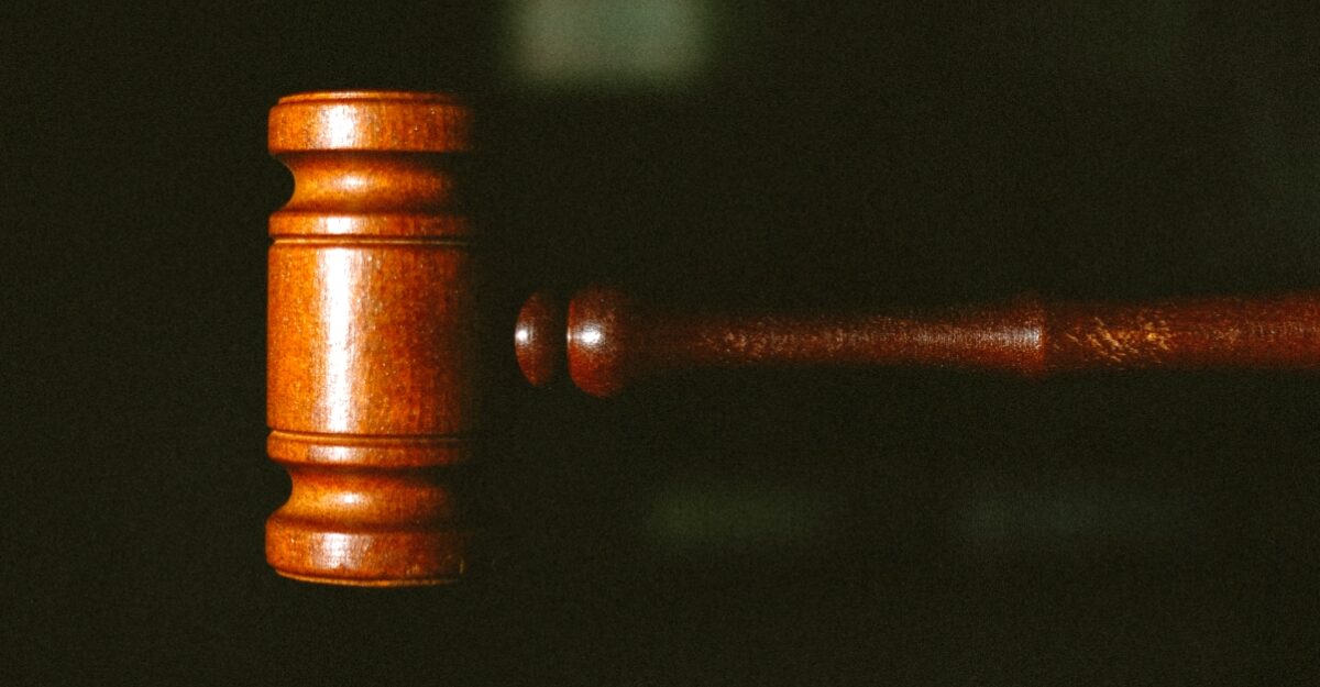 client-win-ontario-it-specialist-may-2025 A photo of a brown gavel in front of a dark background. (Photo: Tingey Injury Law Firm / Unsplash)