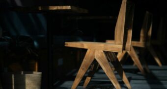 Wooden chair are seen following the furniture manufacturing process.
