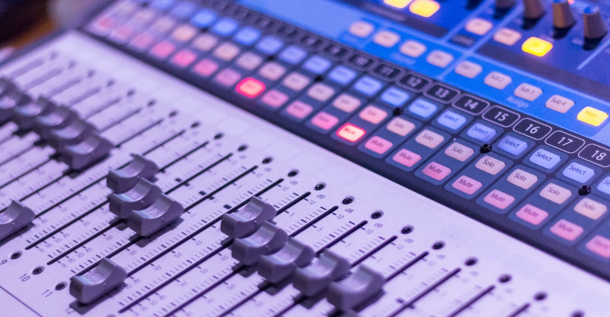 amazon-wondery-job-cuts-august-2025 A photo of a grey and black audio mixer. (Photo: Anthony Roberts / Unsplash)