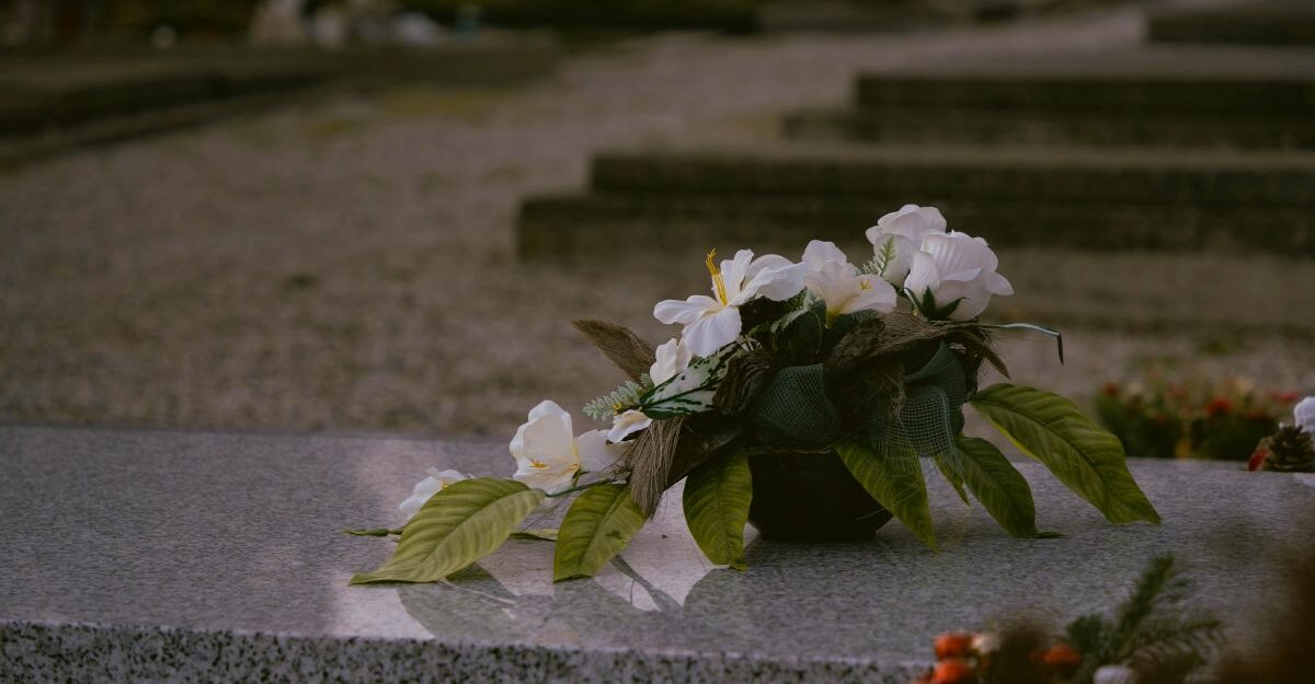 bereavement leave ontario Flowers are seen on top of a tombstone at a local cemetry. (Unsplash)