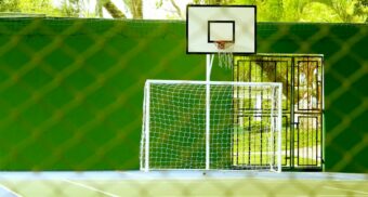 puma-layoffs-severance-pay A basketball net behind a soccer net. (Photo: Daniel Dan / Unsplash)
