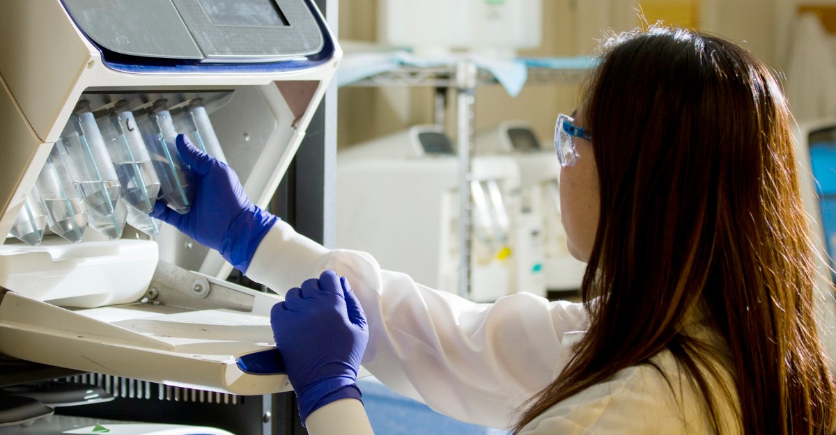 teva-layoffs-severance-pay A scientist looking at various samples in a lab. (Photo: National Cancer Institute / Unsplash)