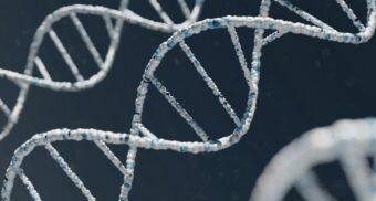 Genetic strands on a black background. (Photo: Warren Umoh / Unsplash)