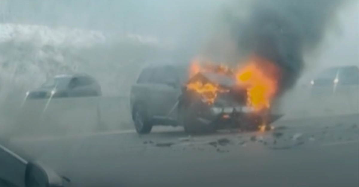 An SUV engulfed in flames on Highway 400 near King Road on Dec. 28, 2025. (Photo: Gnarnia Craft Ceremony Co. / Facebook)