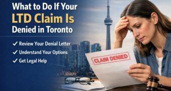 Woman reviewing a long-term disability claim denial letter with the Toronto skyline in the background.