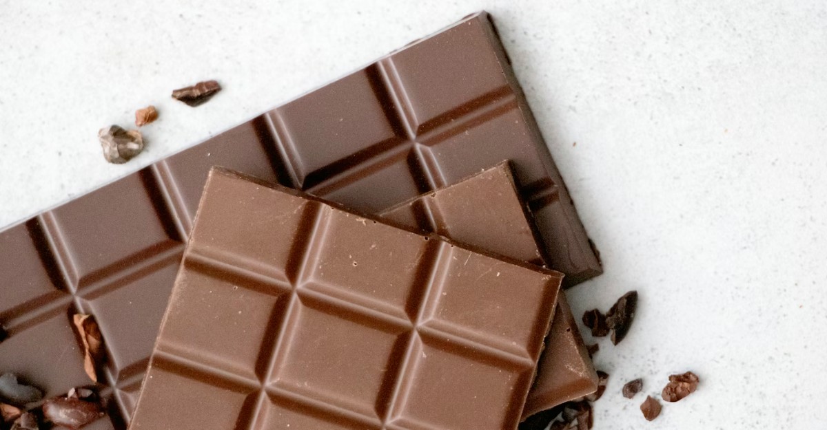 Two chocolate bars on a table. (Photo: Tetiana Bykovets / Unsplash)