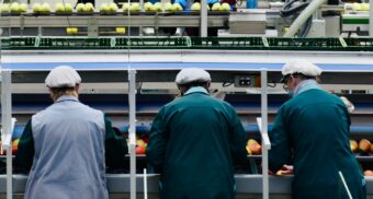 Employees at a food processing company. (Photo: Arno Senoner/Unsplash)