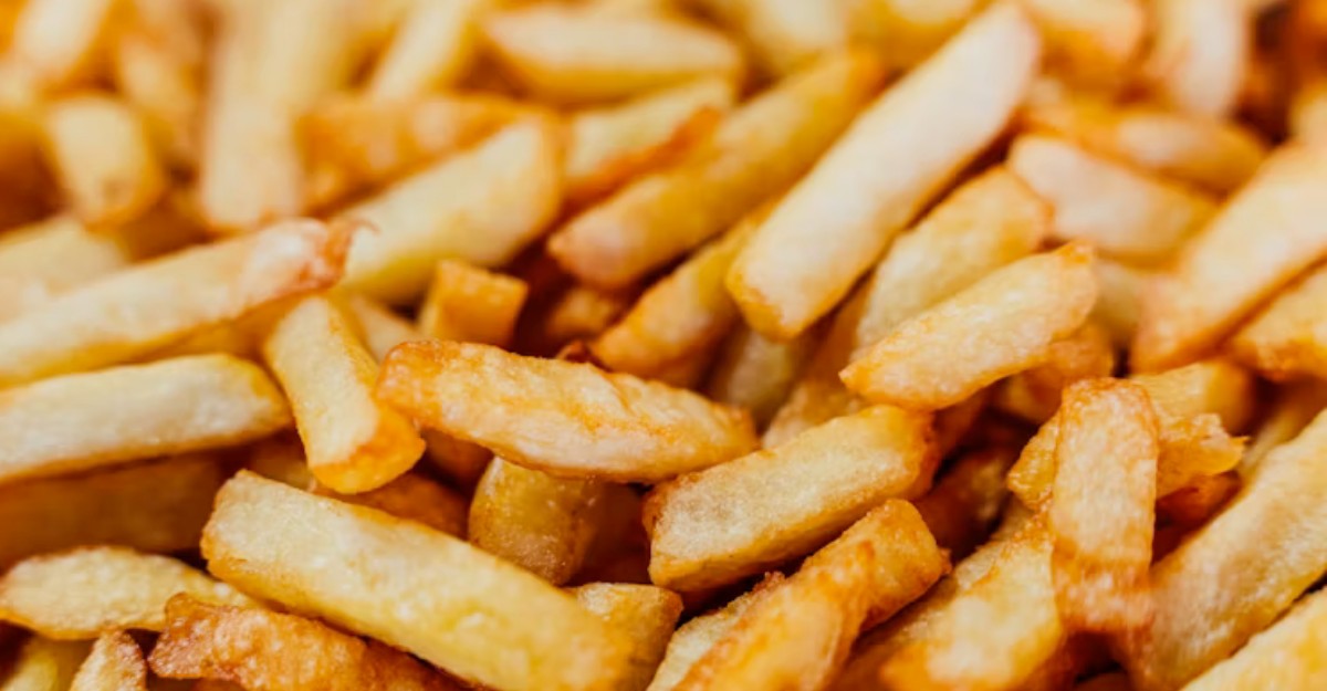 A photo of french fries spread out on a table. (Photo: Durenne Loris / Unsplash)